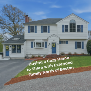 Exterior of a spacious multigenerational home north of Boston with separate entrance potential, blue front doors, landscaped yard, and text overlay reading “Buying a Cozy Home to Share with Extended Family North of Boston.