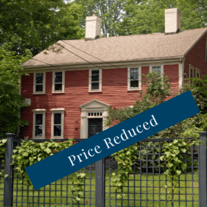 Classic Massachusetts home with "Price Reduced" banner