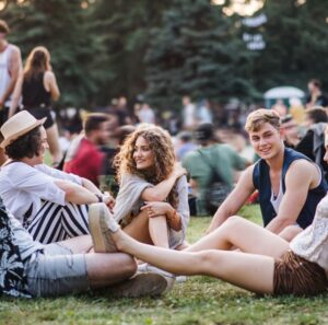friends enjoying an outdoor concert in the summer near woburn, ma