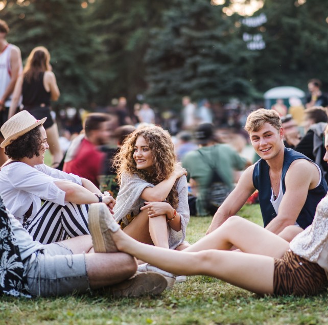 friends enjoying an outdoor concert in the summer near woburn, ma