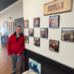 Nick Face Standing in front of Bonny's wall in Empower on Haven in Reading Massachusetts